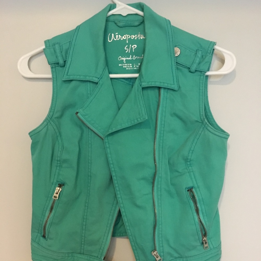 Super cute teal vest!